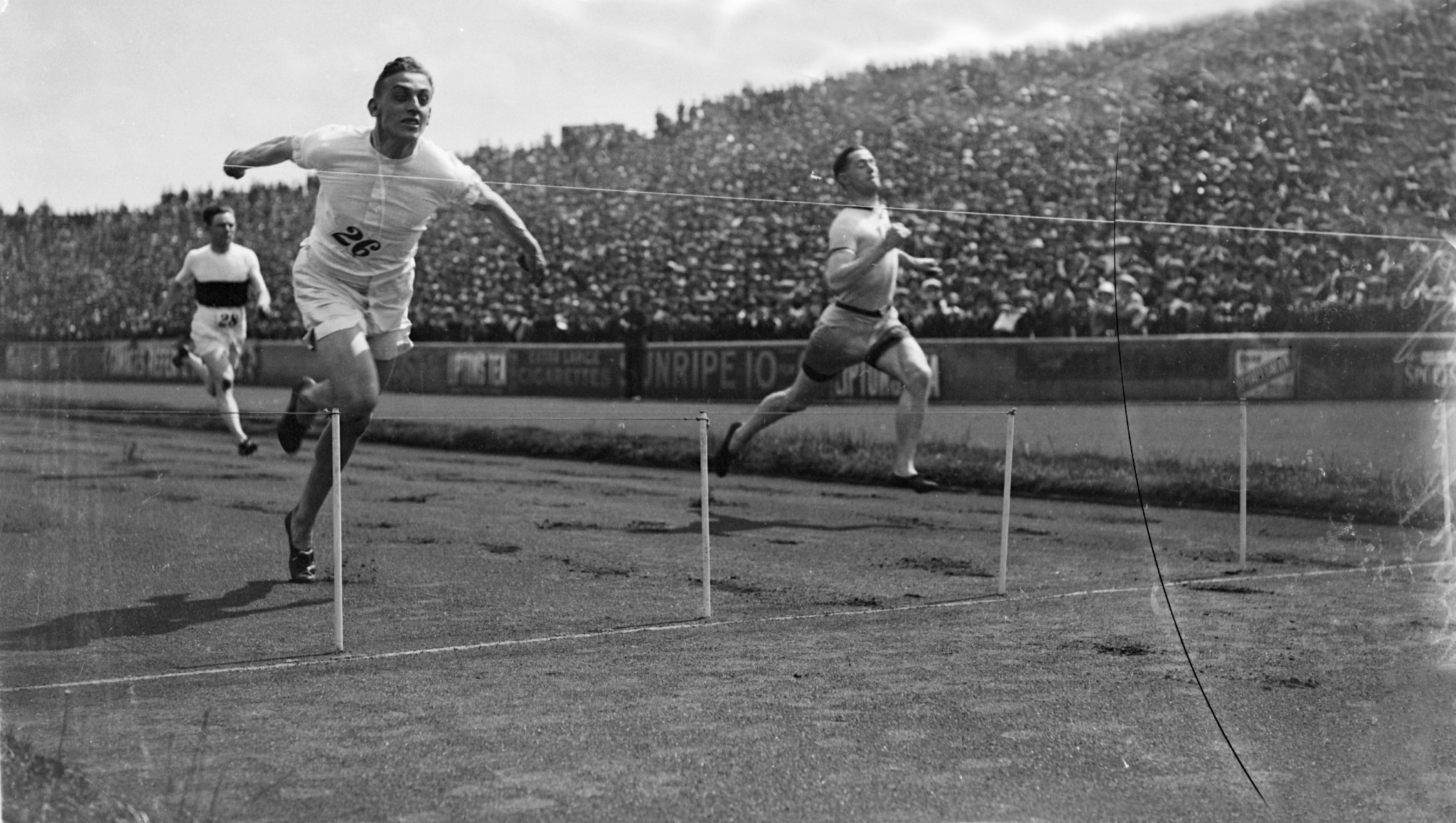 Harold Abrahams dips for the line in a race in 1924 - the same year as the Paris Olympics ©Getty Images
