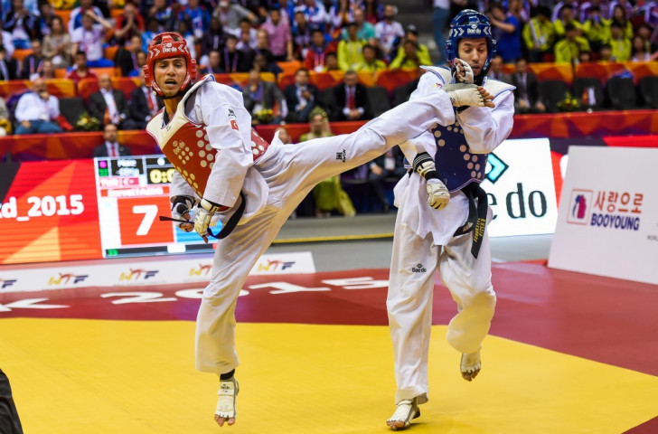 Servet Tazegul (left) kicked and spun his way to a second world title ©WTF