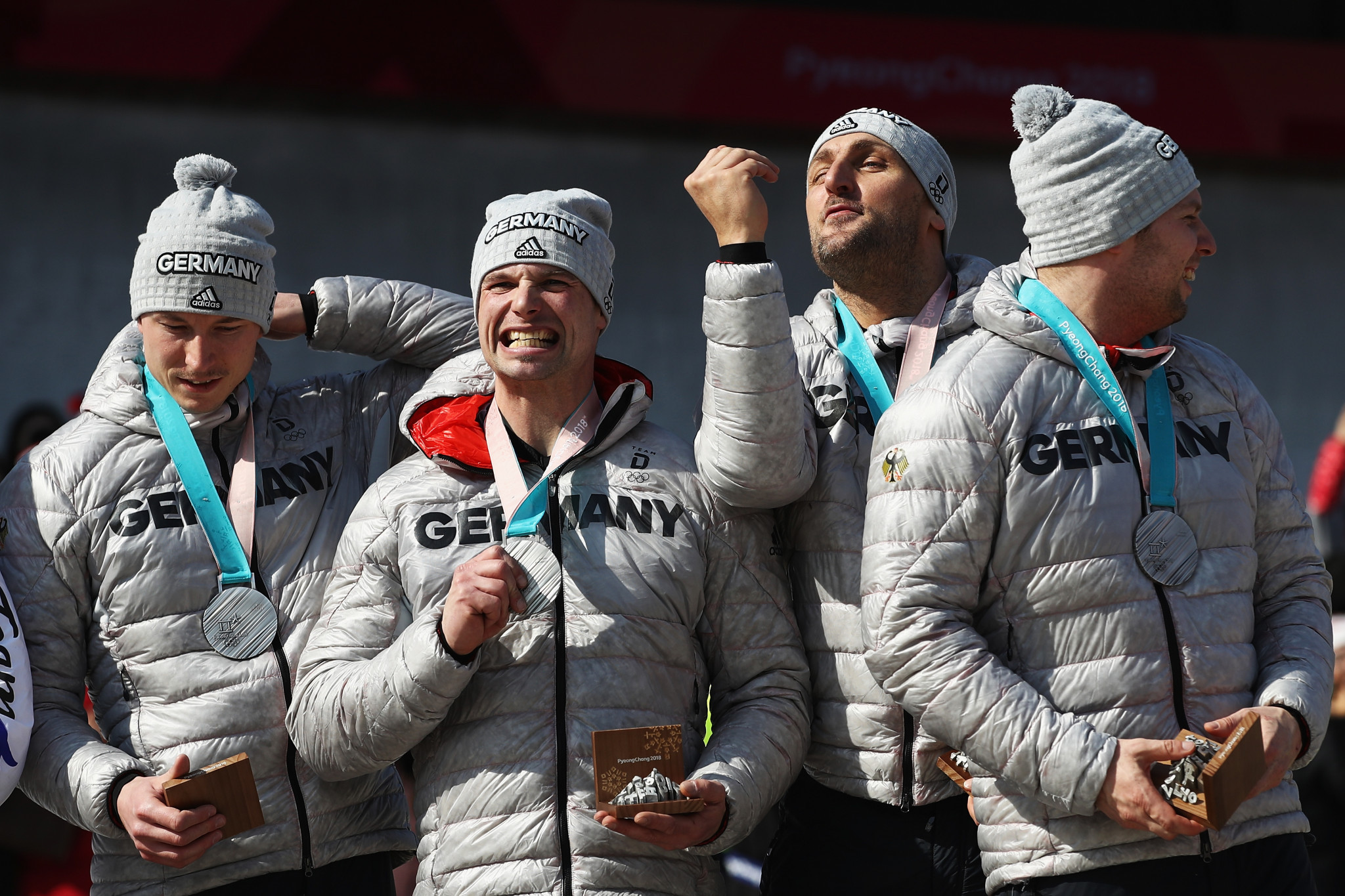 Alexander Rödiger, second left, is a two-time Olympic silver medallist ©Getty Images