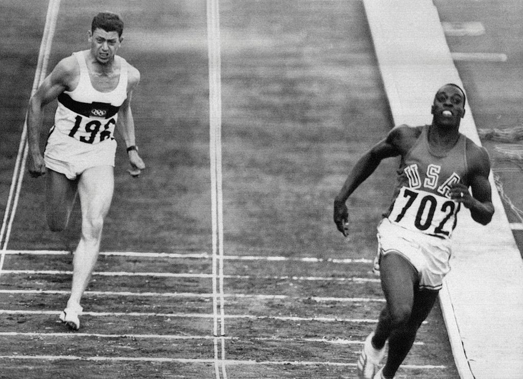 Bob Hayes, pictured winning the 1964 Olympic 100 metres title in Tokyo, went on to become a Super Bowl winner with Dallas Cowboys in 1972 ©Getty Images