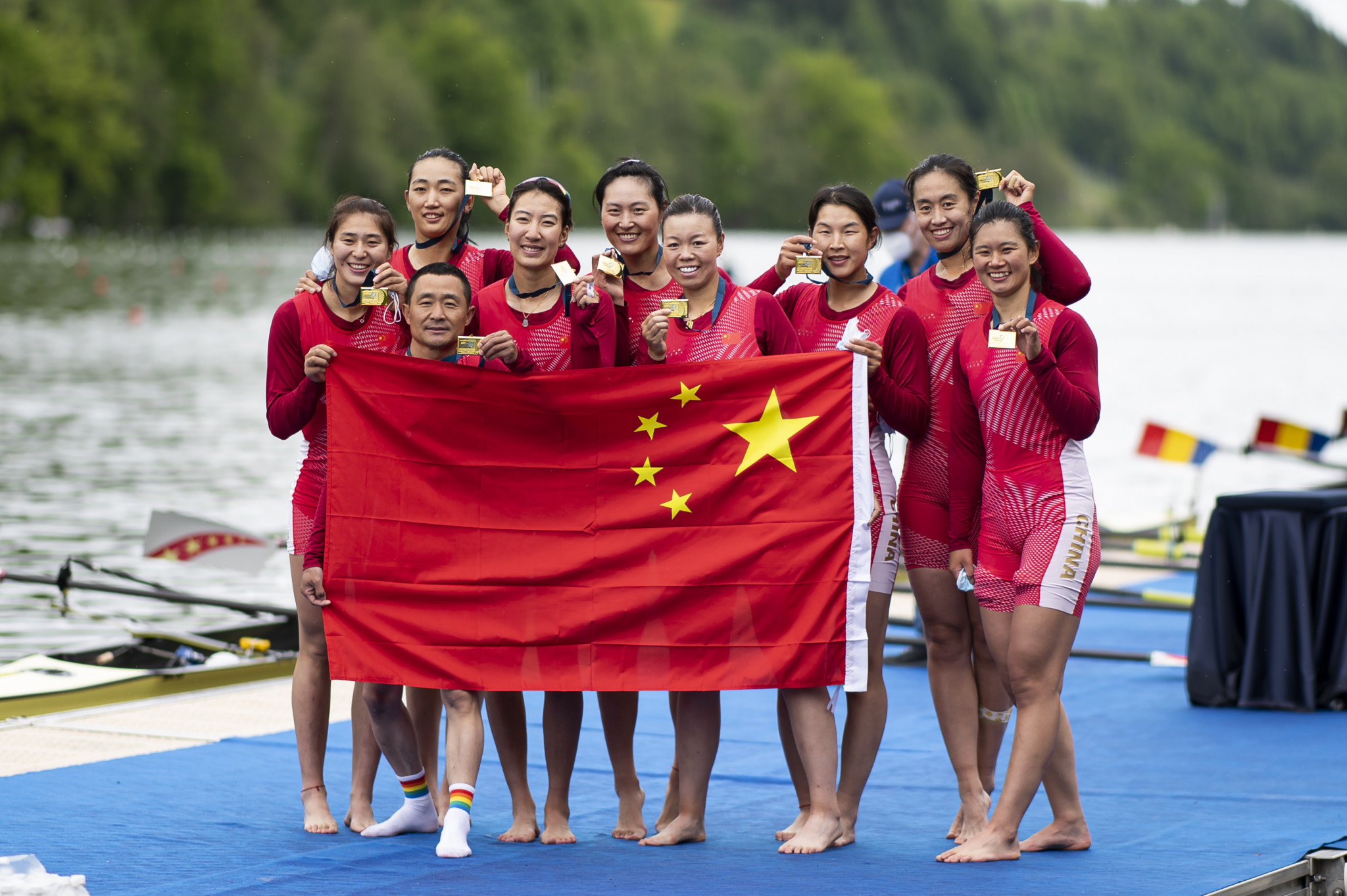 The Chinese women's eight crew celebrate after securing their place at Tokyo 2020 ©Getty Images