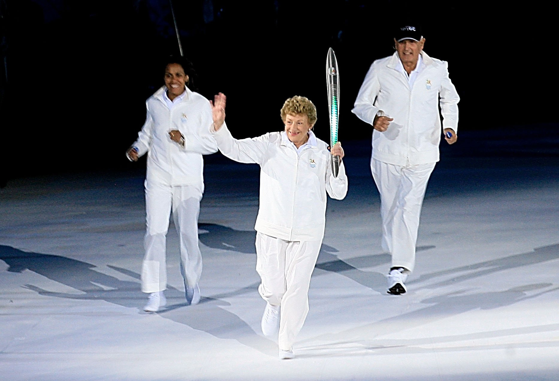 Marjorie Jackson-Nelson, holding the Queen's Baton at Melbourne 2006, has received life membership from Commonwealth Games Australia ©Getty Images