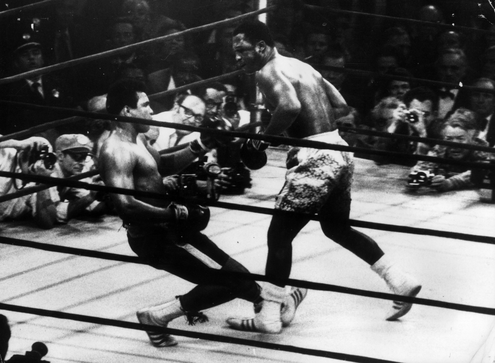 Muhammad Ali, left, and Joe Frazier were each guaranteed $2.5 million for the 