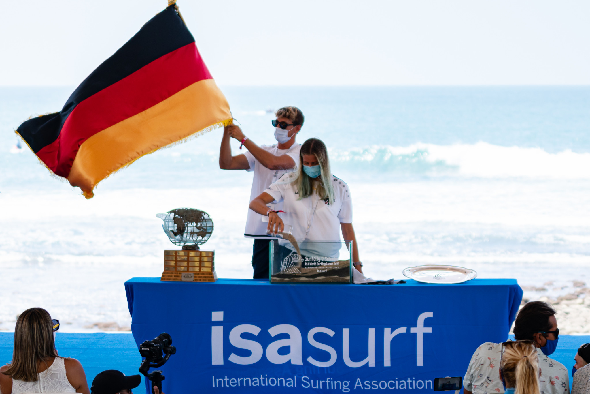 Germany's participants take part in the Sands of the World ceremony during the World Surfing Games Opening Ceremony ©ISA/Ben Reed