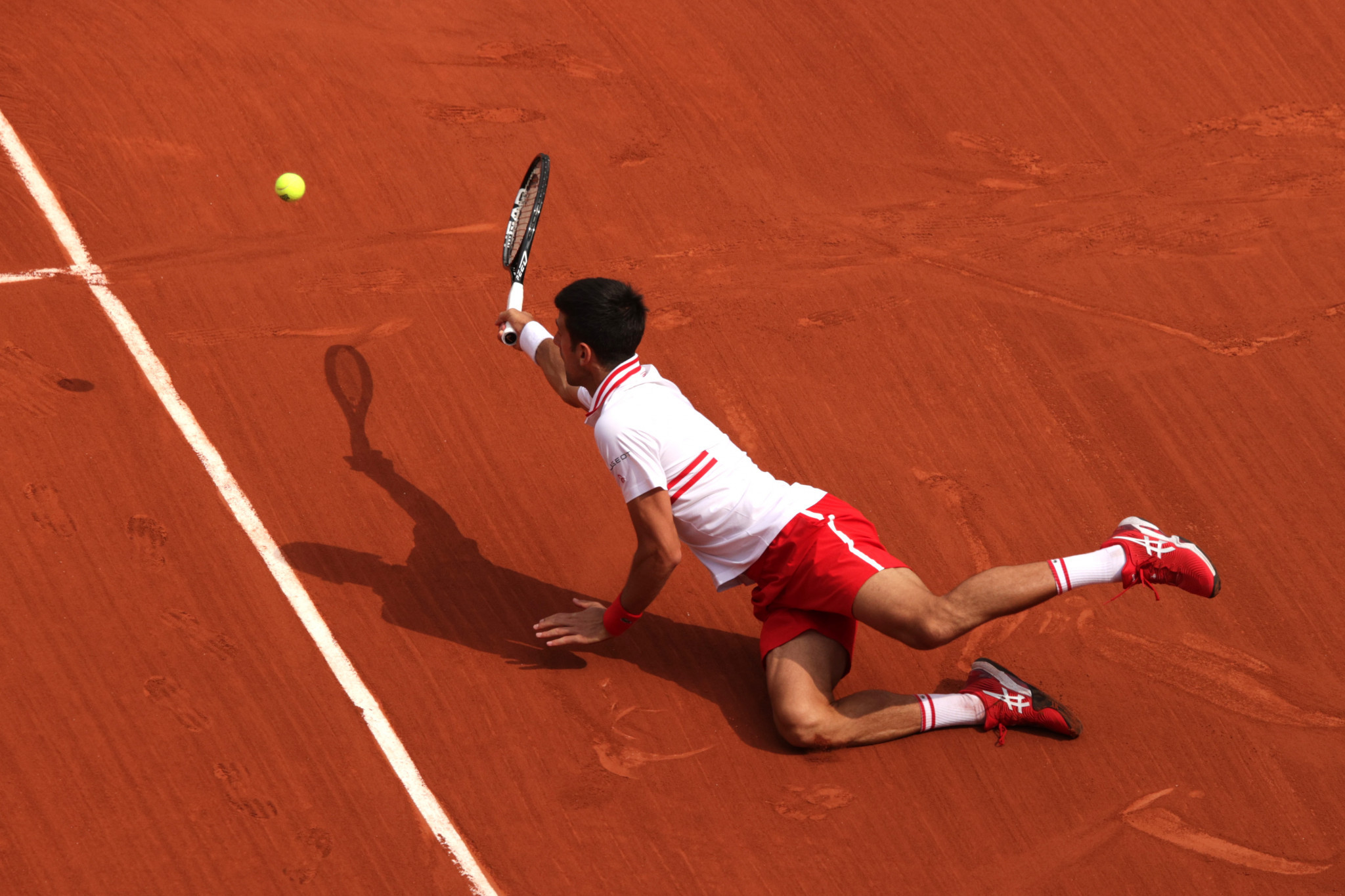 Men's top seed Novak Djokovic battled back from two sets down to beat Lorenzo Musetti at the French Open ©Getty Images