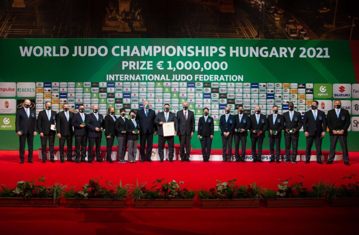 The International Judo Federation presented medals to 16 referees officiating at the World Championships in Budapest ©IJF