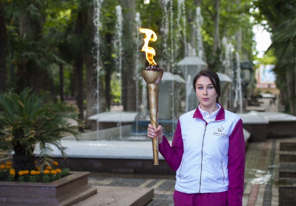 Matanat Latifova holds the Torch in the Khan's Garden in Ganja ©Baku 2015 