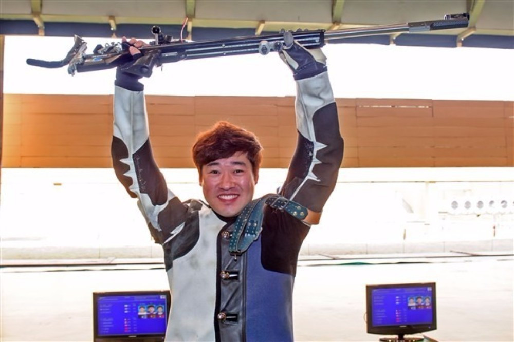 South Korea's Kim Jonghyun earned gold in the men's 50m rifle prone to earn a quota place