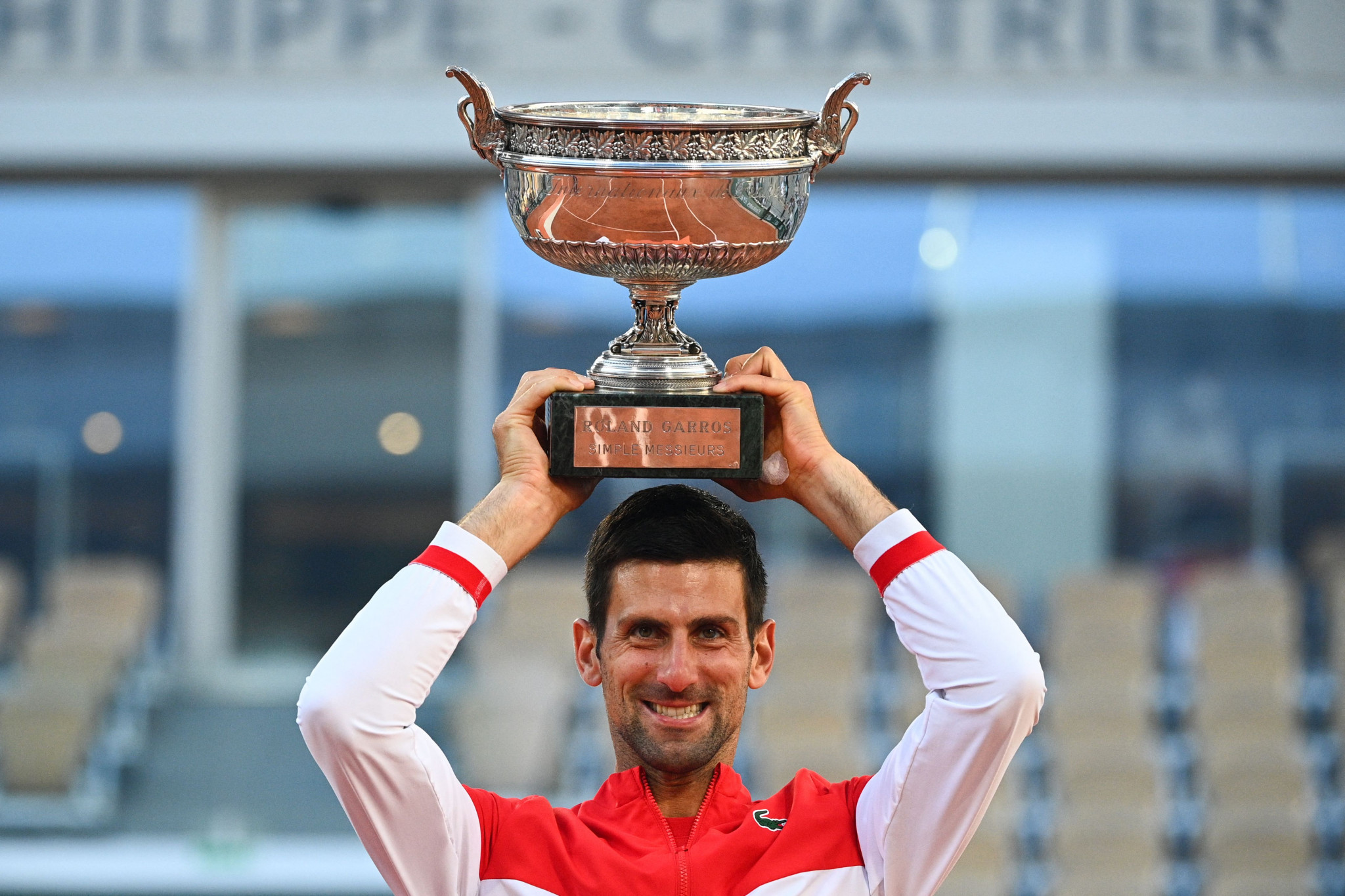 Djokovic comes from two sets down to win second French Open title