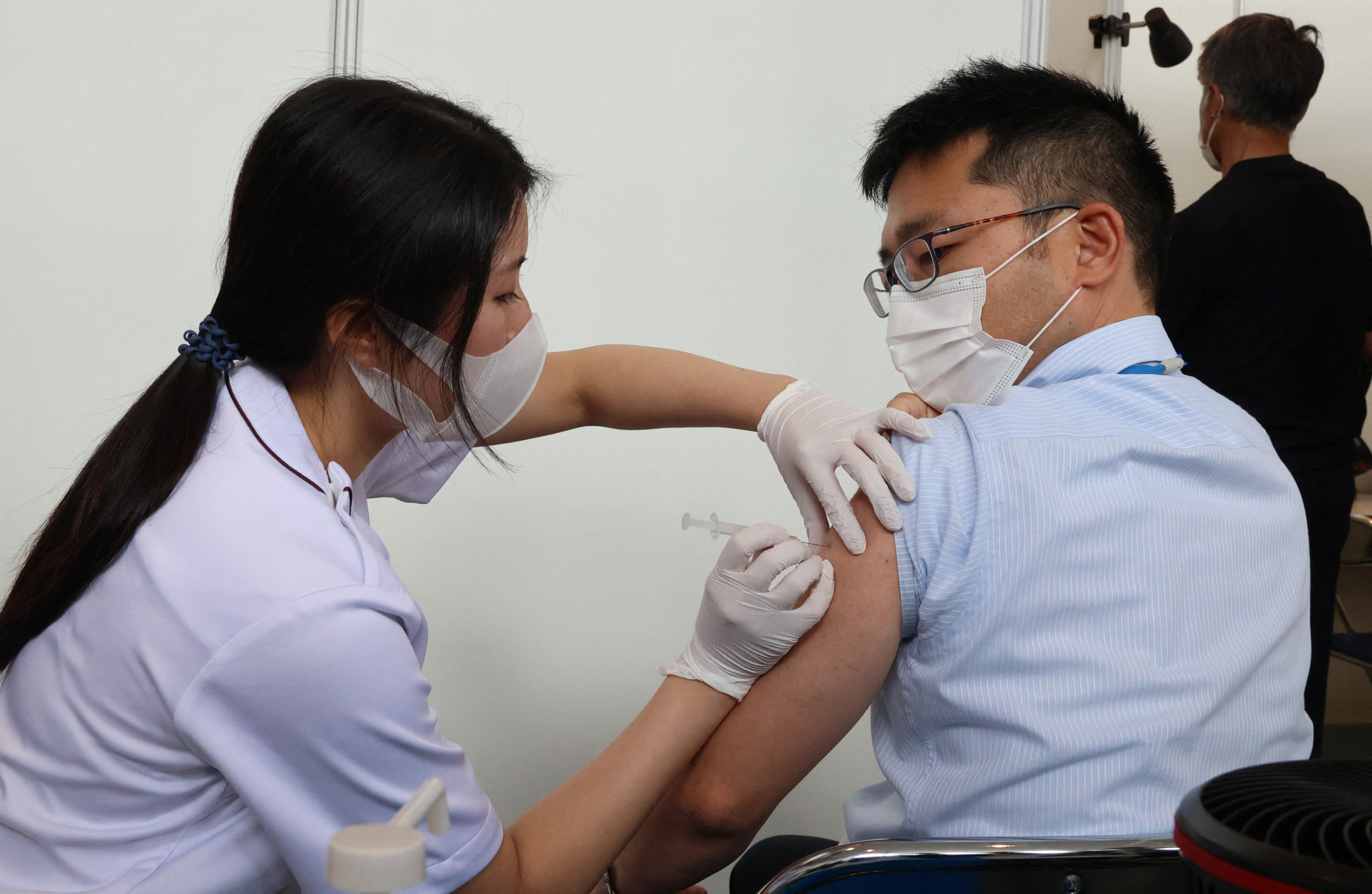 Workers at Tokyo 2020 start to receive COVID-19 vaccinations