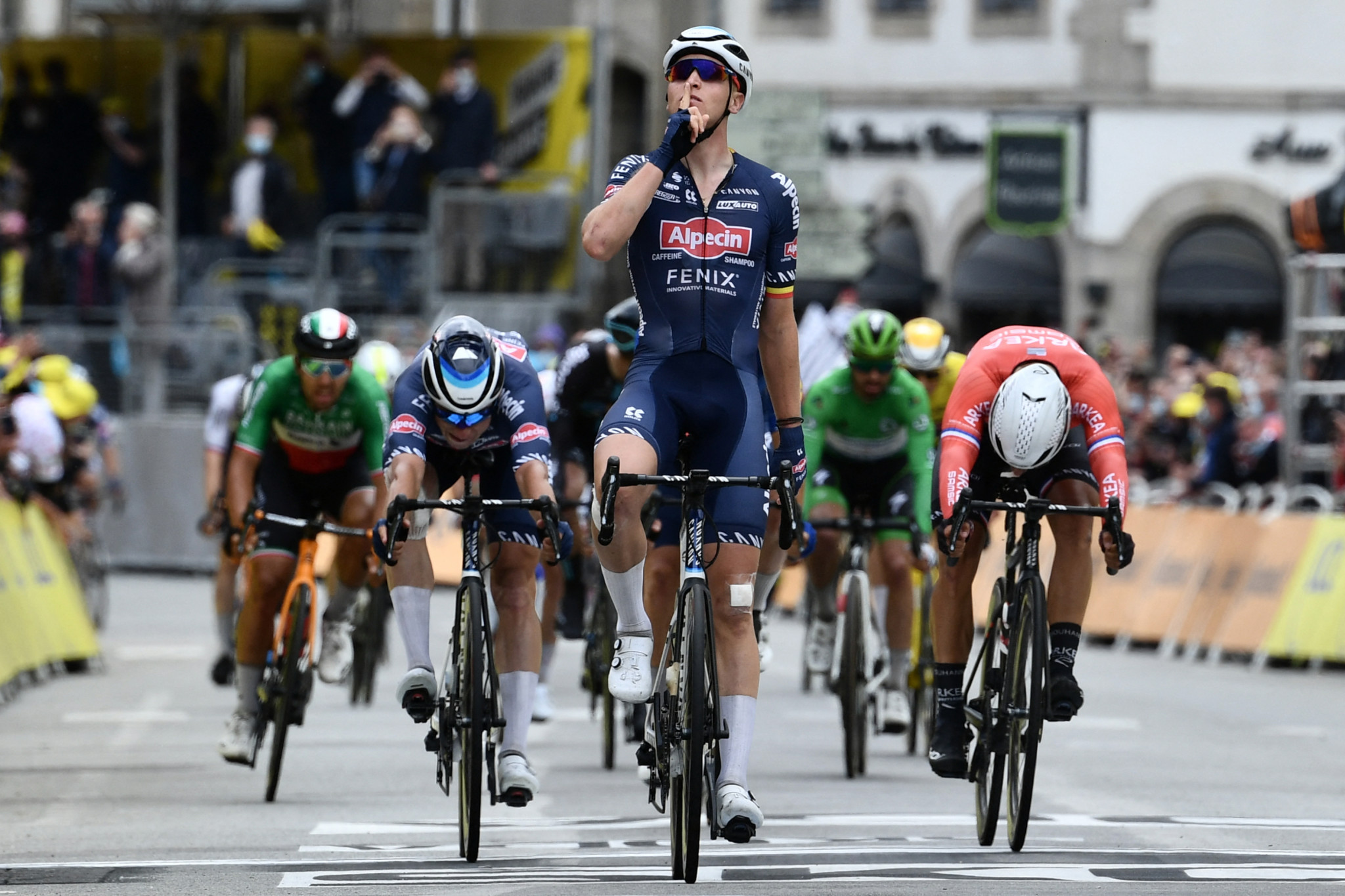 Merlier wins crash-marred third stage of Tour de France