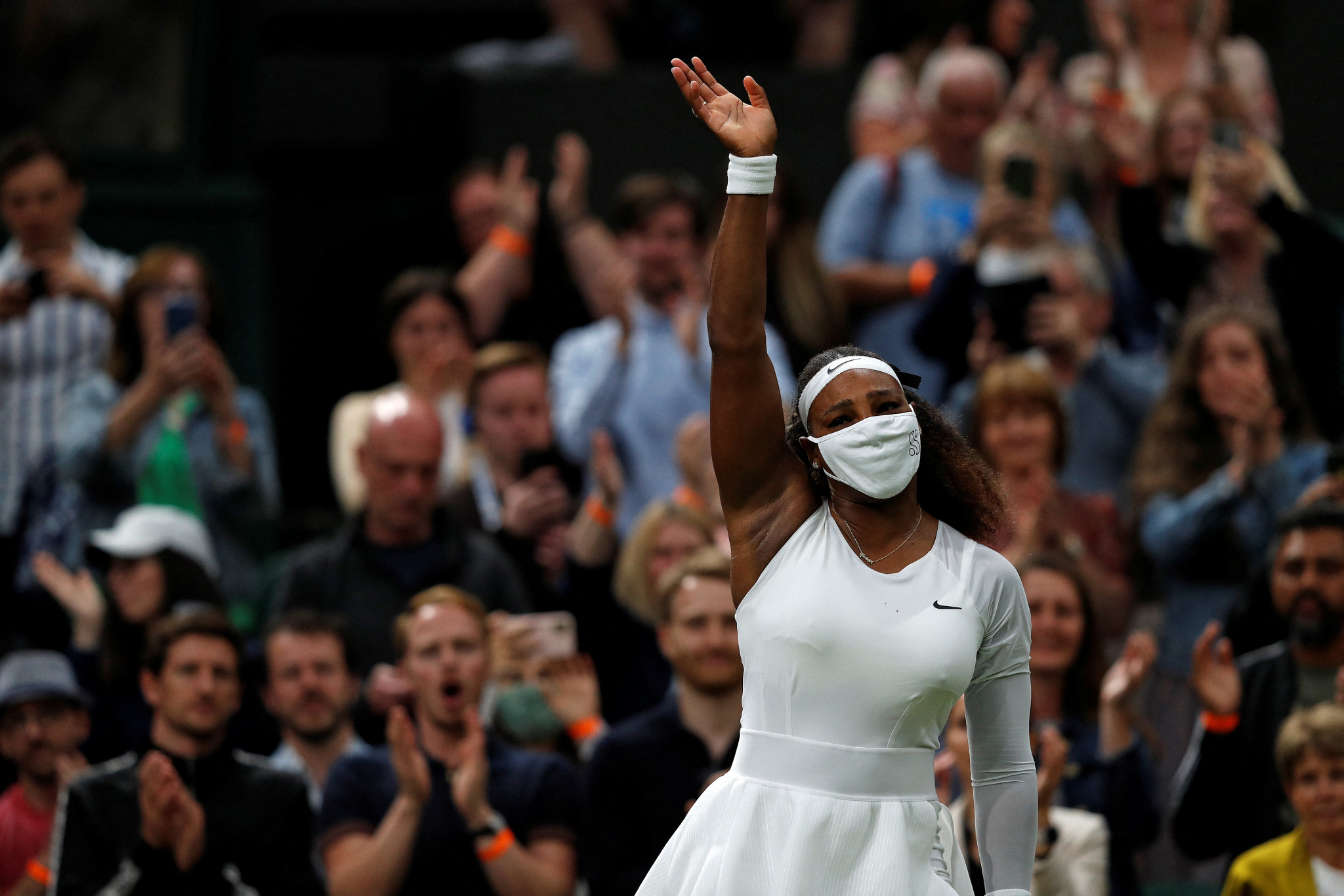Injured Williams exits Wimbledon in round one but top seed Barty through