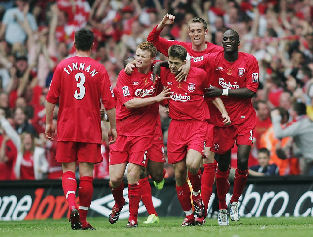 Liverpool captain Steven Gerrard is mistakenly embraced by his team-mates during the 2006 FA Cup final after his piledriving late effort from 35 yards has bounced off the post and West Ham United remain with a 3-2 lead which they hold until the final whistle. Not. ©Getty Images