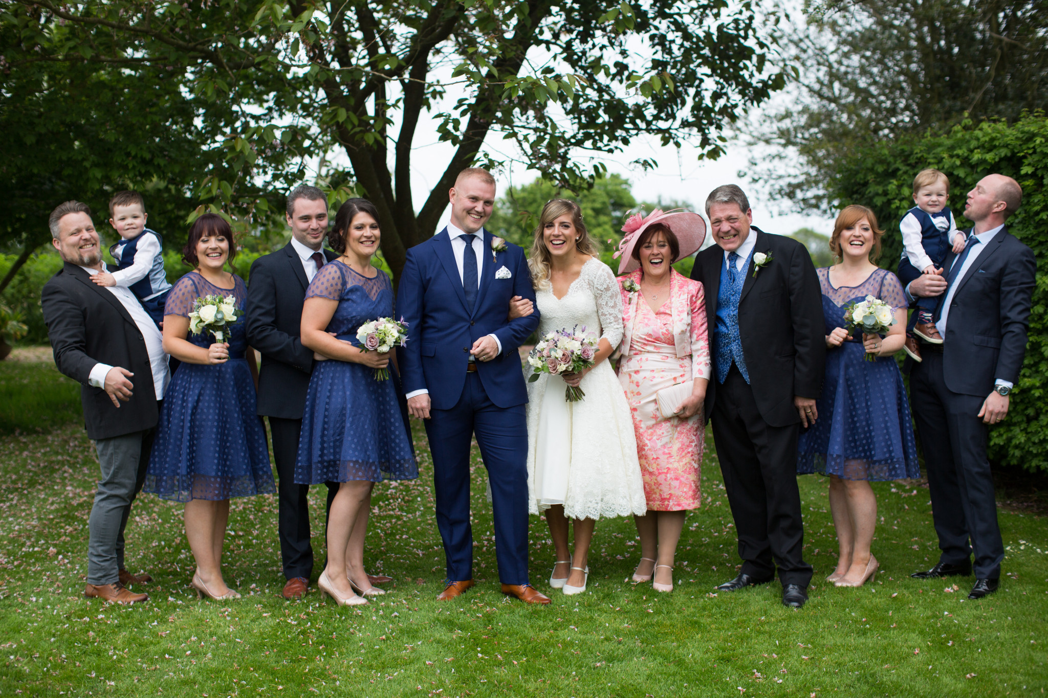 Emily Godley, centre in white, and family at her wedding, with her late mother to her left in pink ©Emily Godley