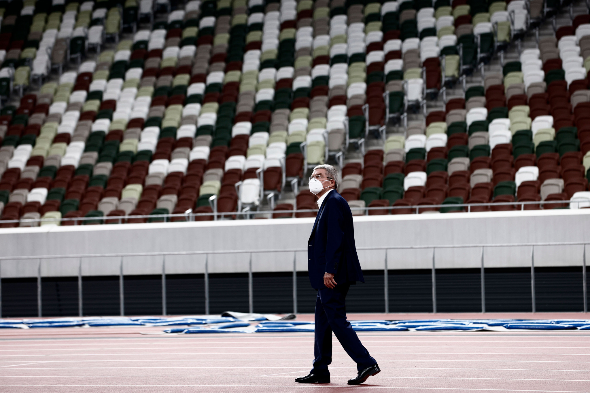 IOC President Thomas Bach said the piped in crowd noise was being used to 