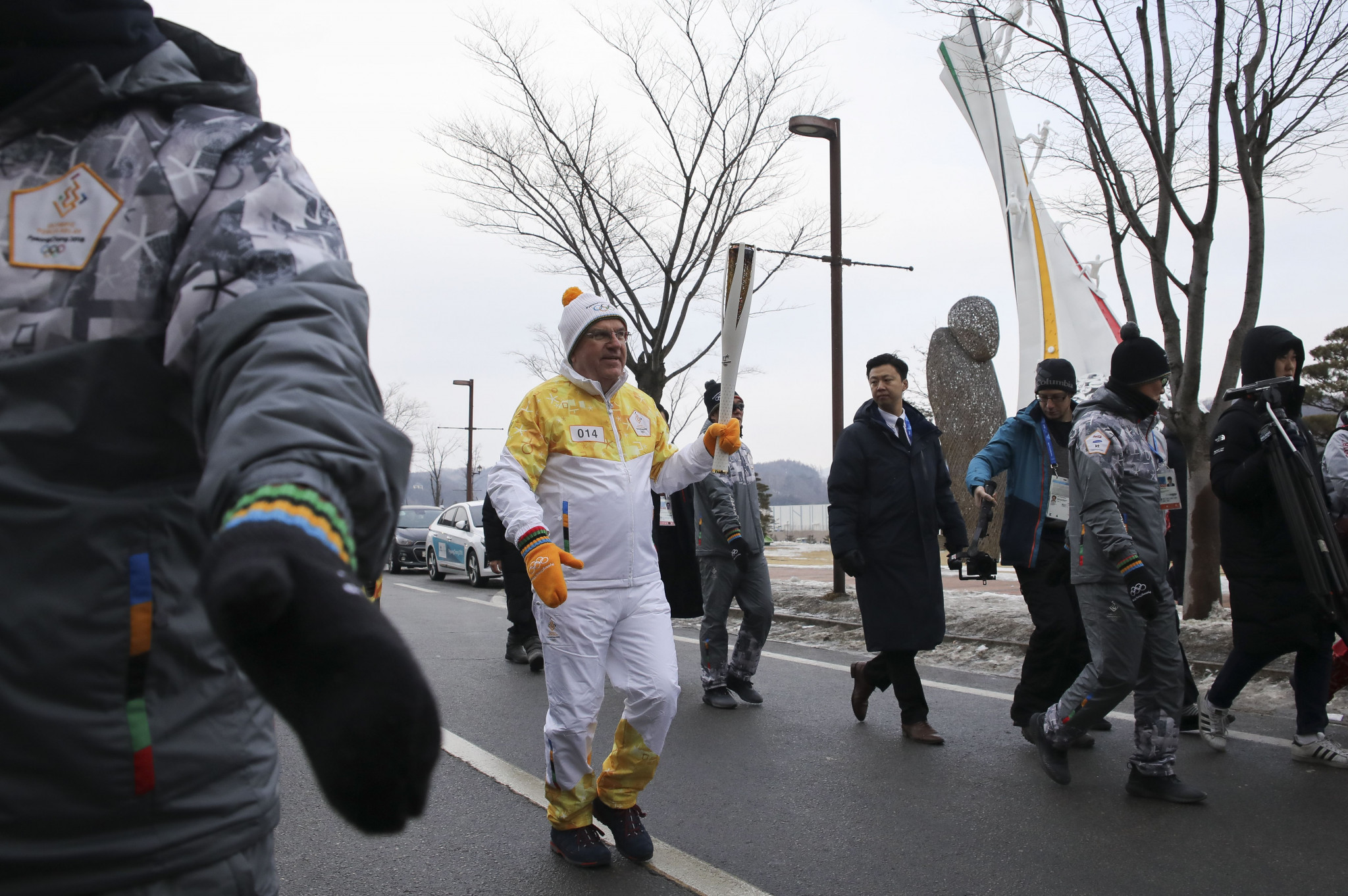 IOC President Thomas Bach, here carrying the Pyeongchang 2018 Torch, will not do so at Tokyo 2020 ©Getty Images