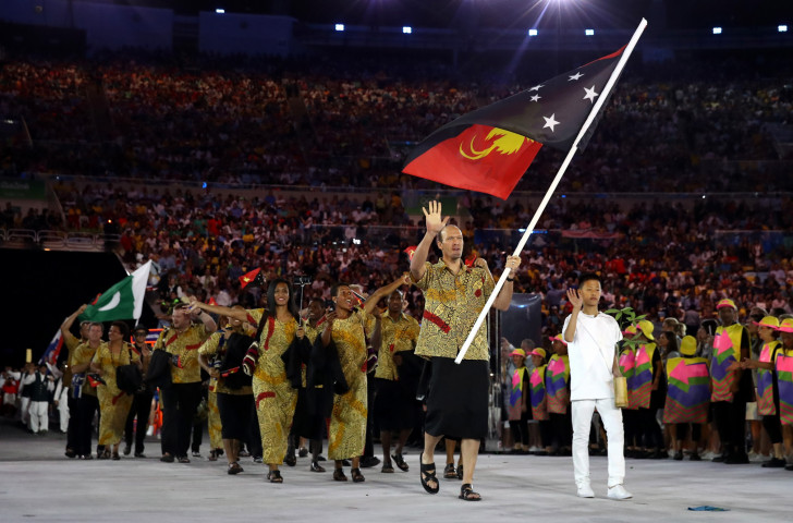Swimmer Ryan Pini carried the Papua New Guinean flag at the Rio 2016 Opening Ceremony ©Getty Images
