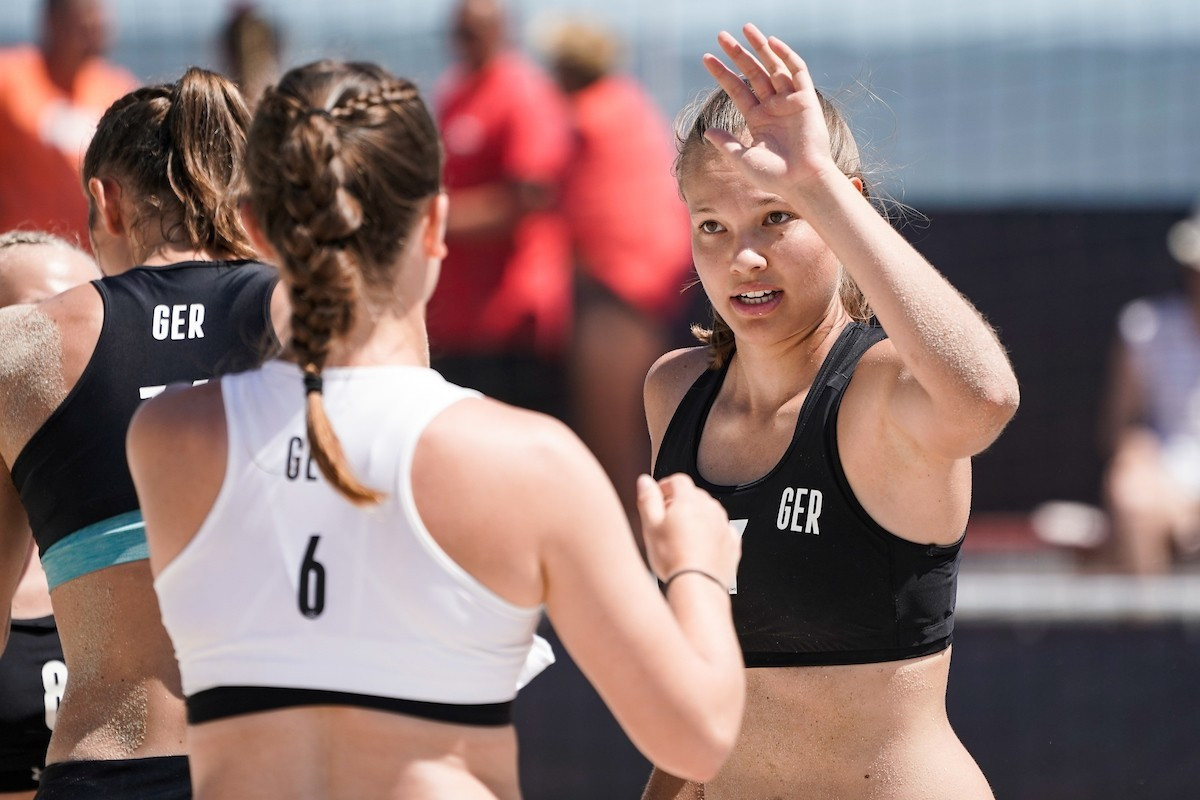 Denmark's men and German women win European beach handball titles amid bikini row
