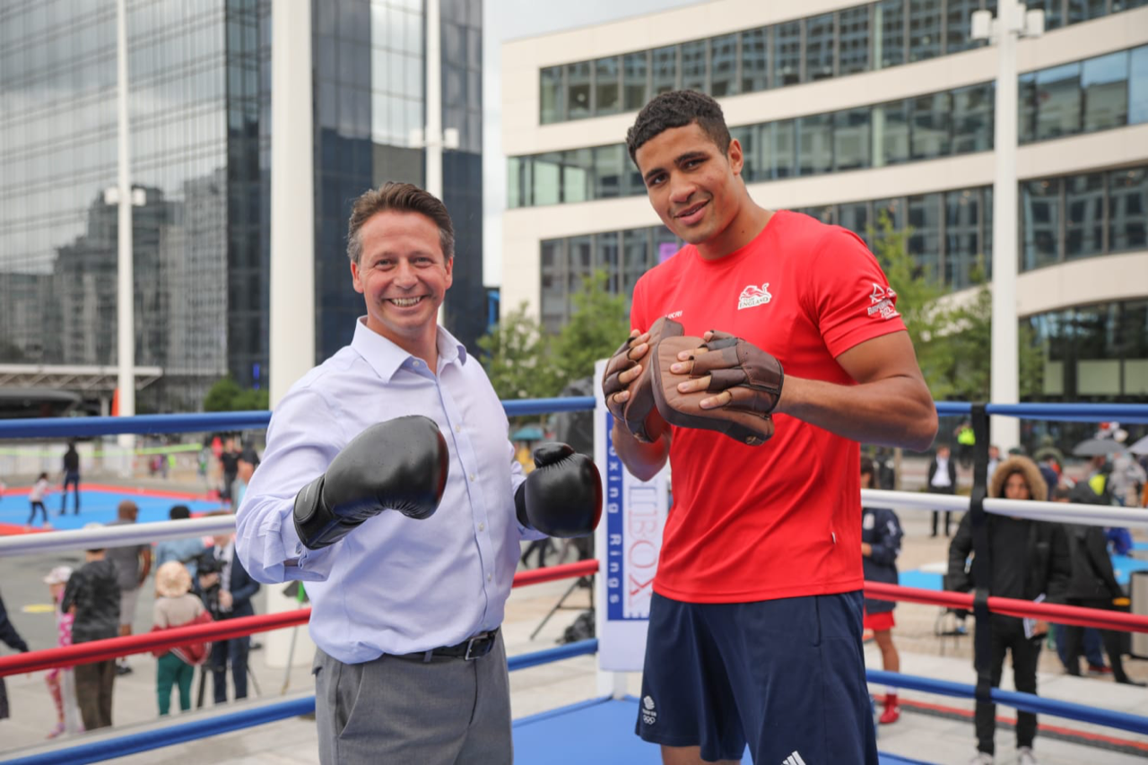 Delicious Orie, right, pictured with Minister of Tourism Nigel Huddleston, left, has eyes on representing England at Birmingham 2022 ©England Boxing