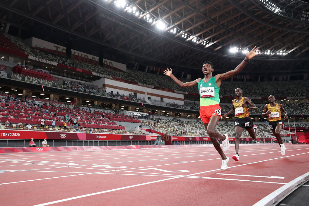 Selemon Barega of Ethiopia judges his finish perfectly to beat Uganda's Joshua Cheptegei and Jacob Kiplimo to the Olympic men's 10,000 metres title in the opening athletics final of the Tokyo 2020 Games ©Getty Images