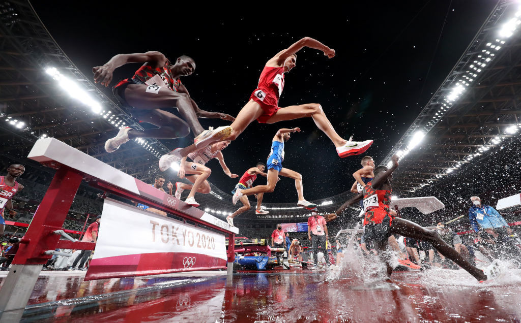 Morocco's Soufiane El Bakkali, number six, en route to a historic victory in the Olympic men's 3,000m steeplechase final ©Getty Images