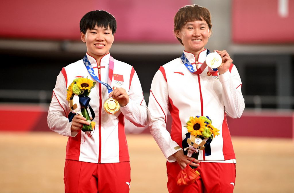 Bao Shanju and Zhong Tianshi wore pins depicting the country's former leader Mao Zedong on the track cycling podium ©Getty Images