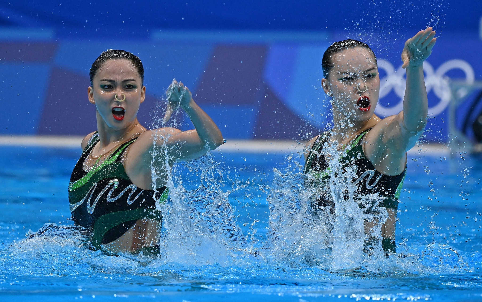 Huang Xuechen, right, is now a six-time Olympic medallist and China's most successful artistic swimmer  ©Getty Images