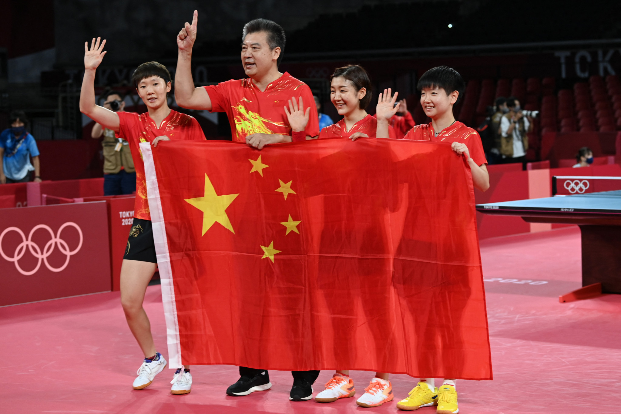 China sweep aside Japan to win gold and remain perfect in Olympic women's table tennis team event