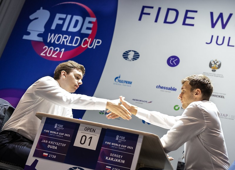 Jan-Krzysztof Duda, left, claimed the Chess World Cup with a win over Sergey Karjakin ©FIDE/David Llada