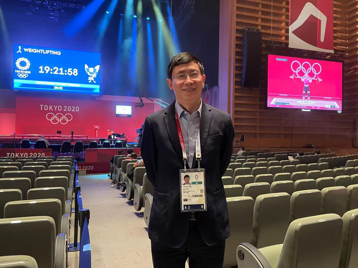 Chinese Weightlifting Association President Zhou Jinqiang said he was "deeply moved" by his team's quest for Olympic medals ©CWA