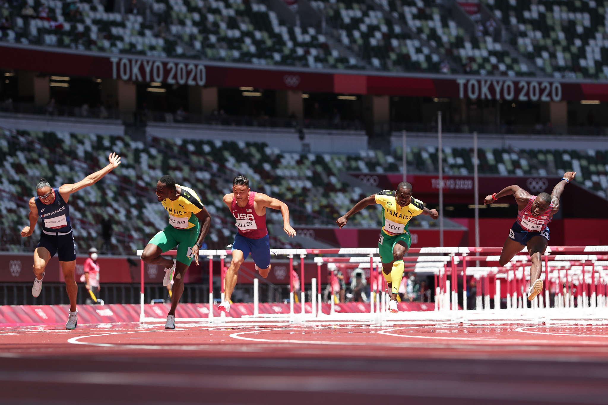 Hansle Parchment, second left, earlier emerged a the surprise winner of the men's 110m hurdles final  ©Getty Images