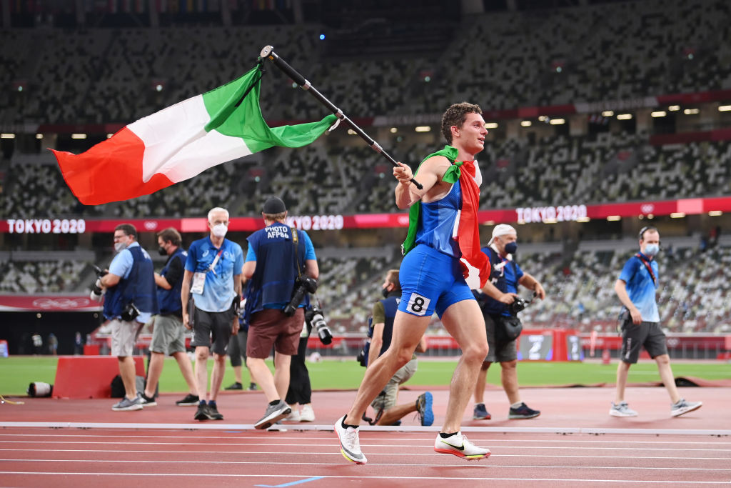 Italy's men's 4x100m relay team celebrate the capture of their country's fifth athletics gold at  Tokyo 2020 ©Getty Images
