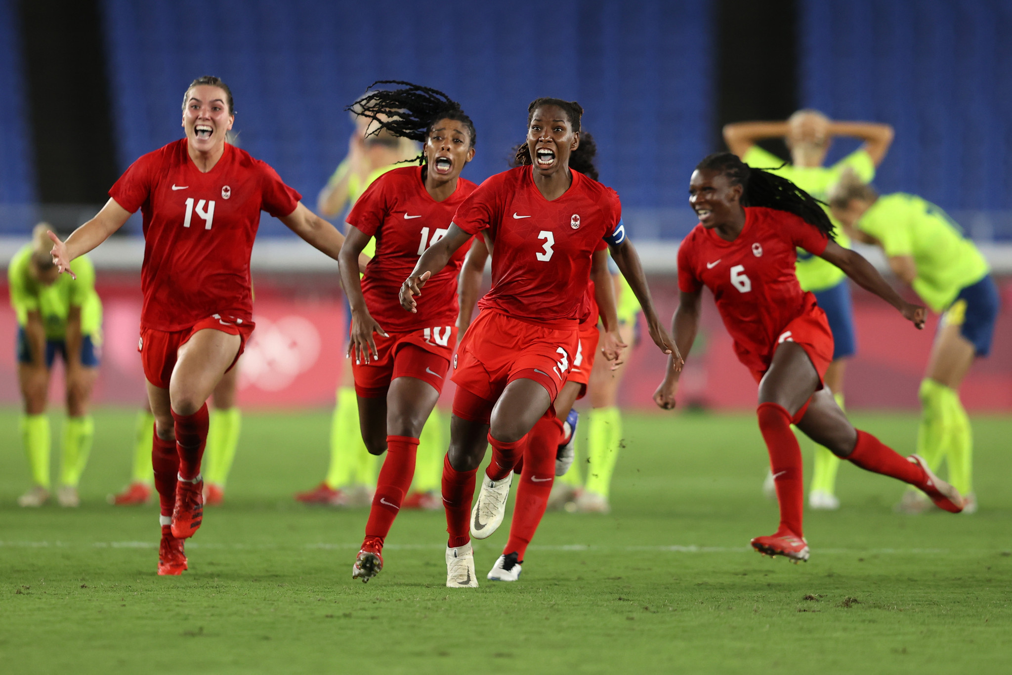 Canada, in red, defeated Sweden on penalties to win the women's football gold medal match ©Getty Images