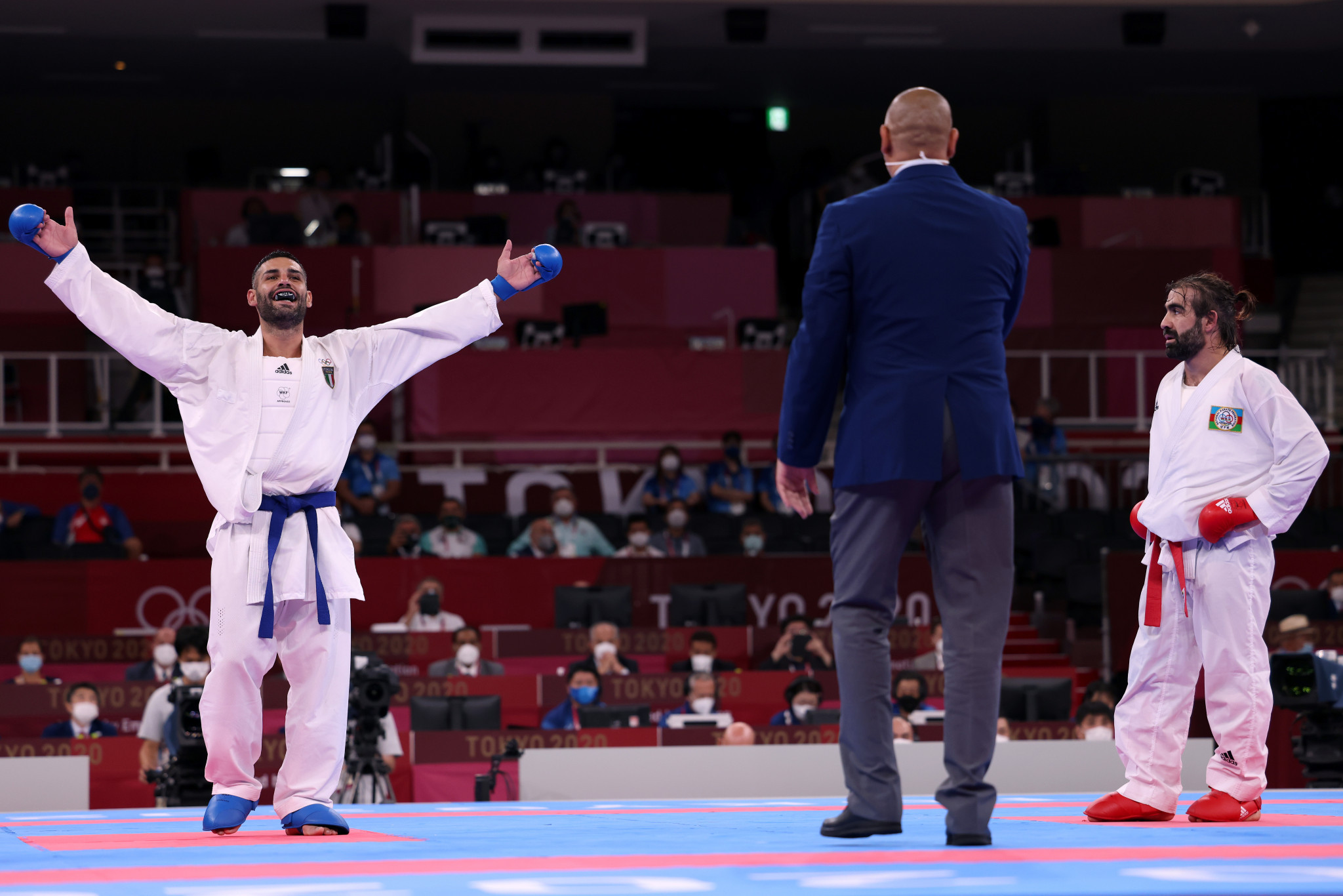 Karateka Luigi Busa celebrates winning a close men's under-75kg kumite final ©Getty Images