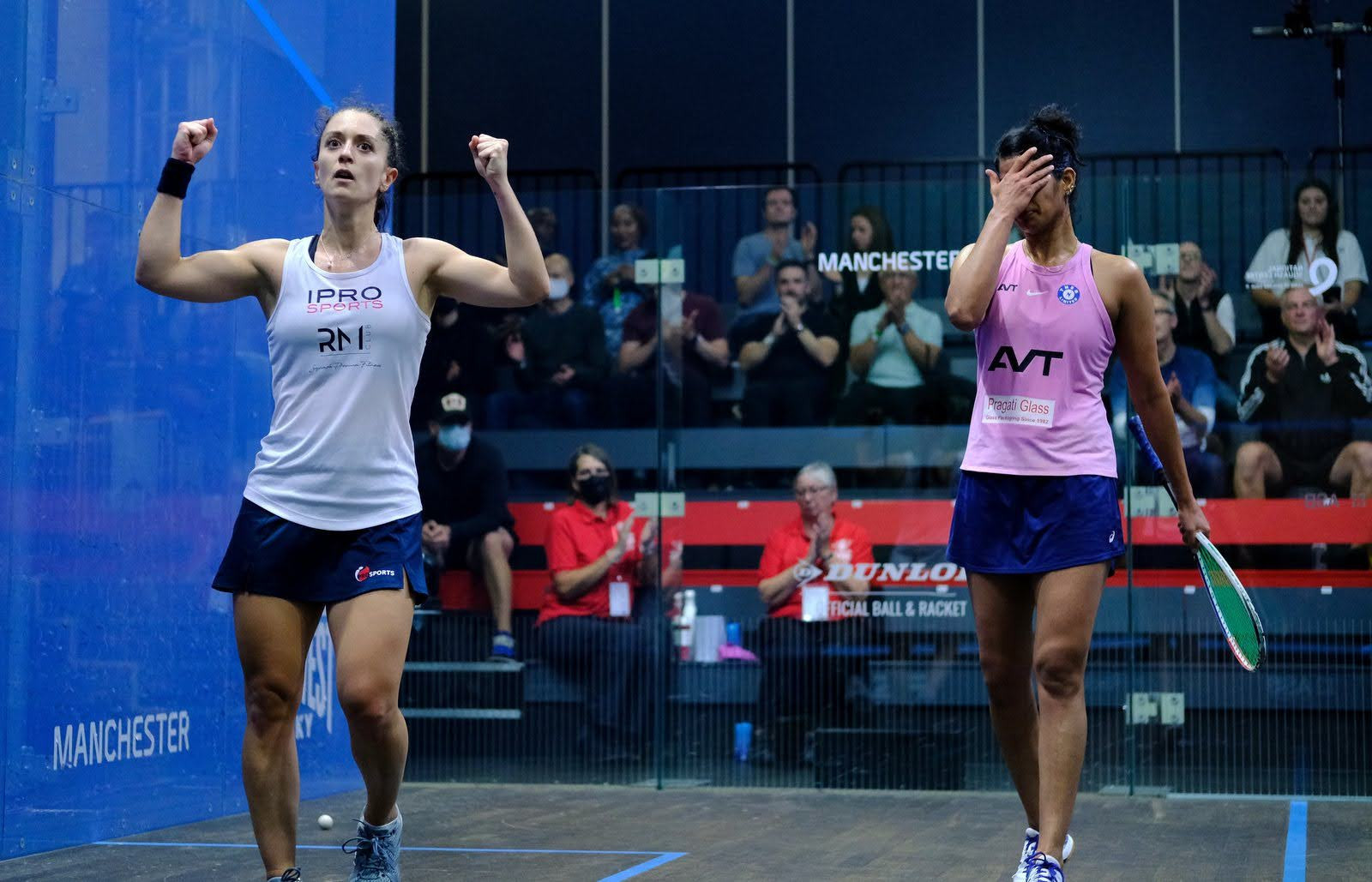 France's Coline Aumard, left, celebrates knocking out women's fourth seed Joshna Chinappa in Manchester ©PSA World Tour
