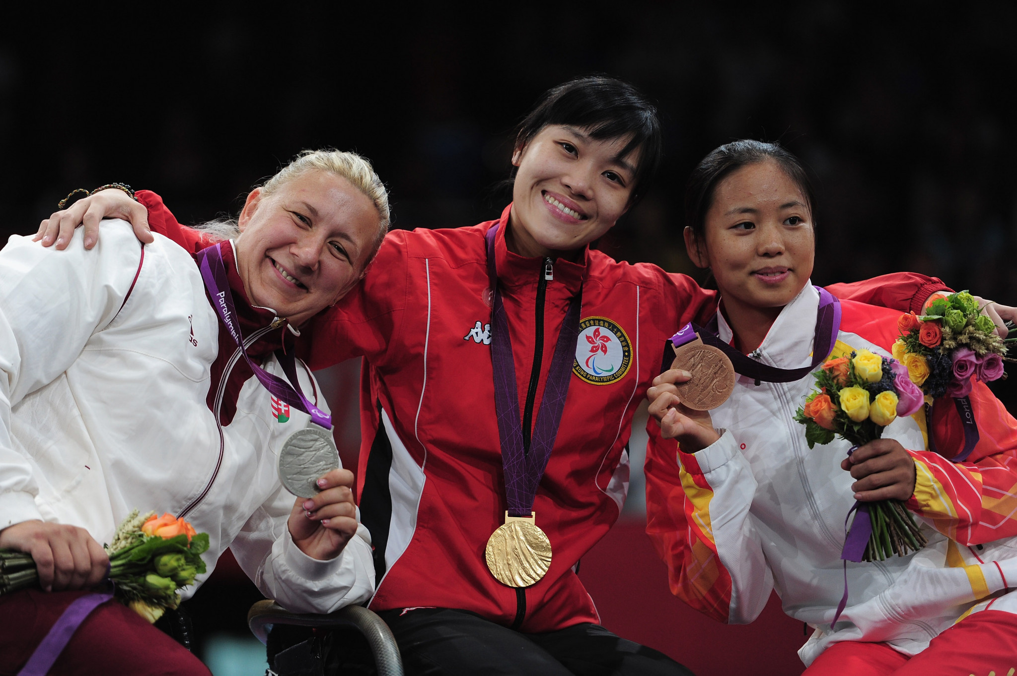 Alison Yu Chui-yee, centre, is a seven-time Paralympic champion ©Getty Images