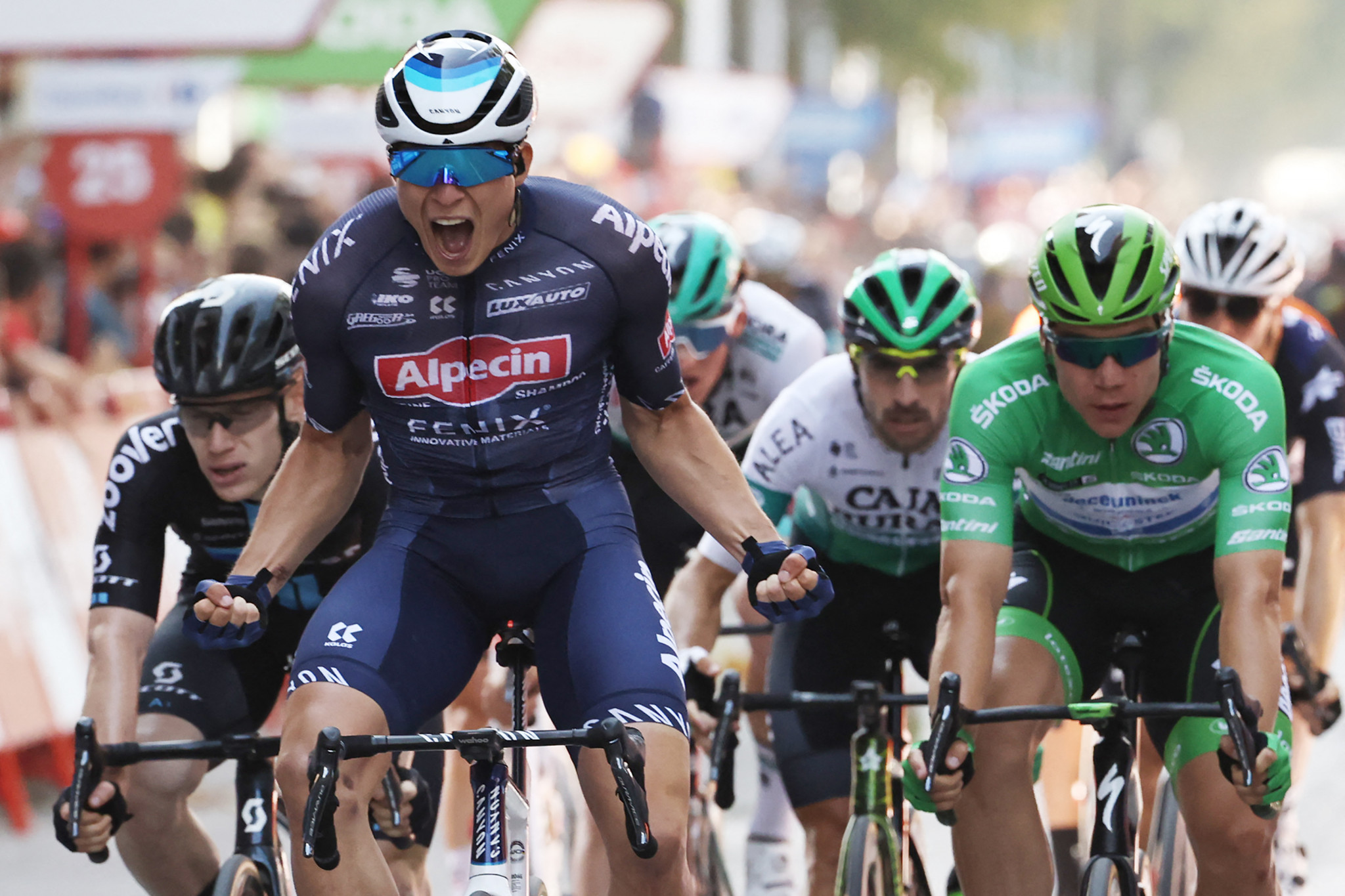 Jasper Philipsen wins stage five of Vuelta a España after enormous crash