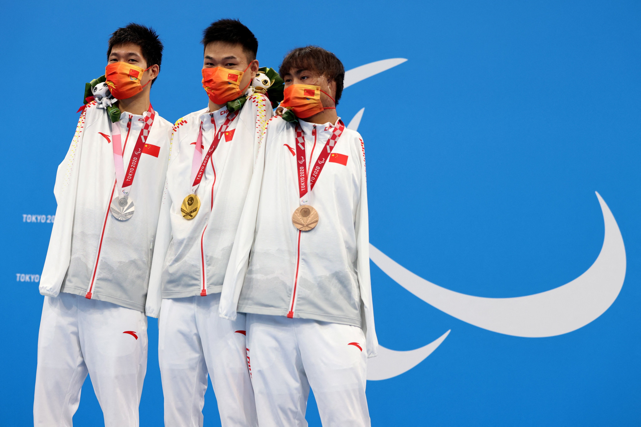 There was a Chinese one-two-three in the men’s S5 50m butterfly, with Zheng Tao - centre - earning the gold ©Getty Images