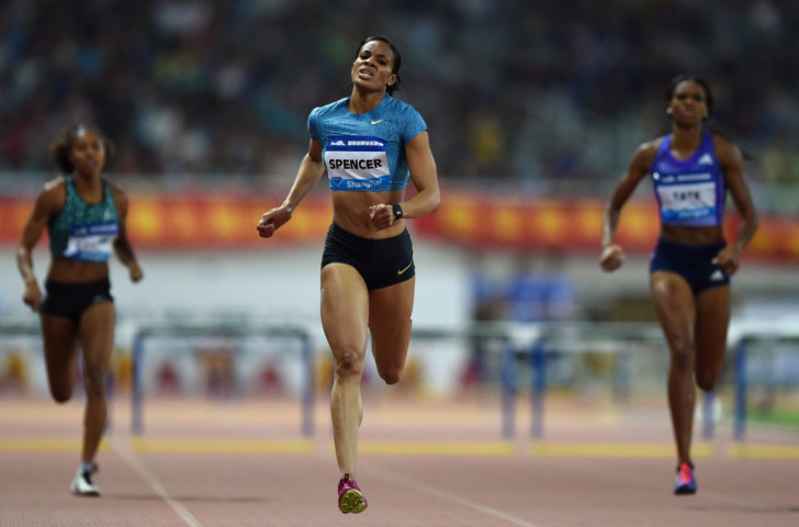Kaliese Spencer comes home to win the women's 400m hurdles in a 2015 world-leading time of 54.71sec at the IAAF Diamond League meeting in Shanghai today