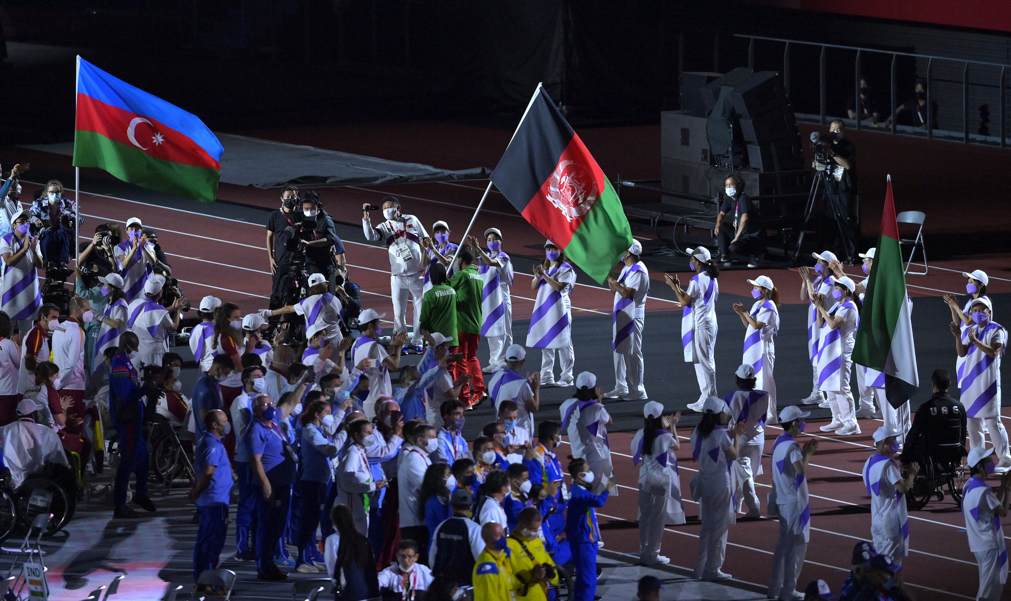 Hossain Rasouli and Zakia Khudadadi carried Afghanistan's flag during the Athletes Parade ©Getty Images
