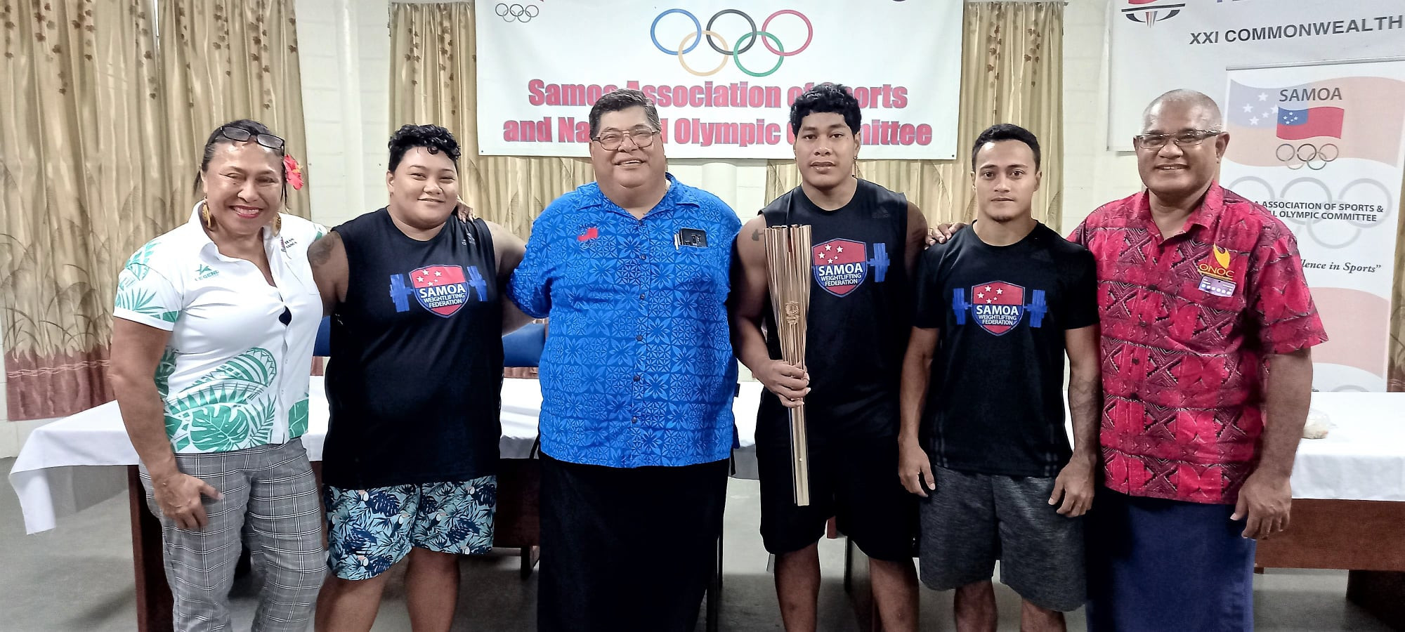 The three weightlifters were presented with their uniforms and gifts at a small gathering held by the SASNOC ©SASNOC