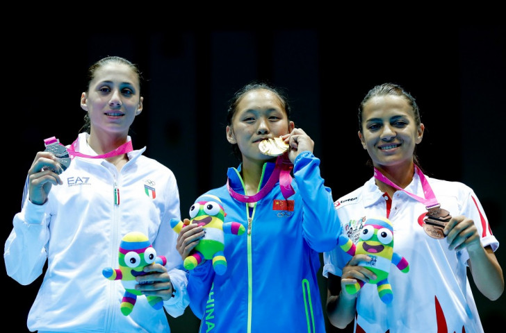Italy's Irma Testa (left), a Nanjing 2014 Youth Olympic Games silver medallist  used her height advantage successfully against Chinese Taipei's Liu Chia Chun