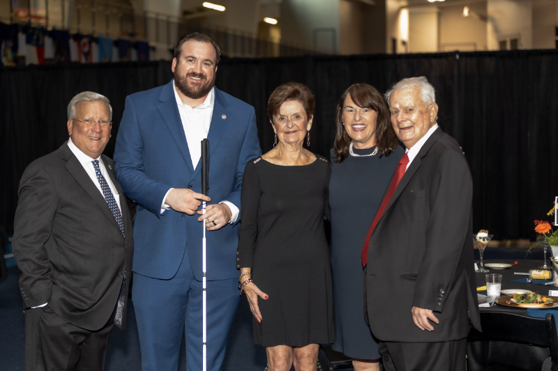 United States Association of Blind Athletes have established the Ron Plassman Gold Standard Award to honour philanthropist Ron Plassman, far right ©USABA
