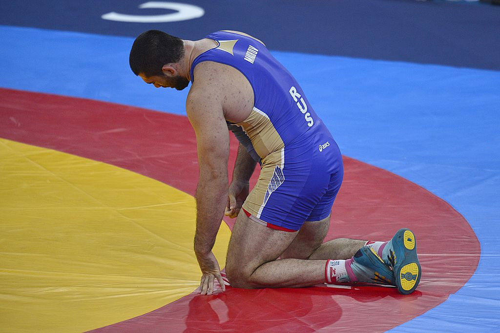 Russian wrestler upgraded to London 2012 gold given four-year doping ban