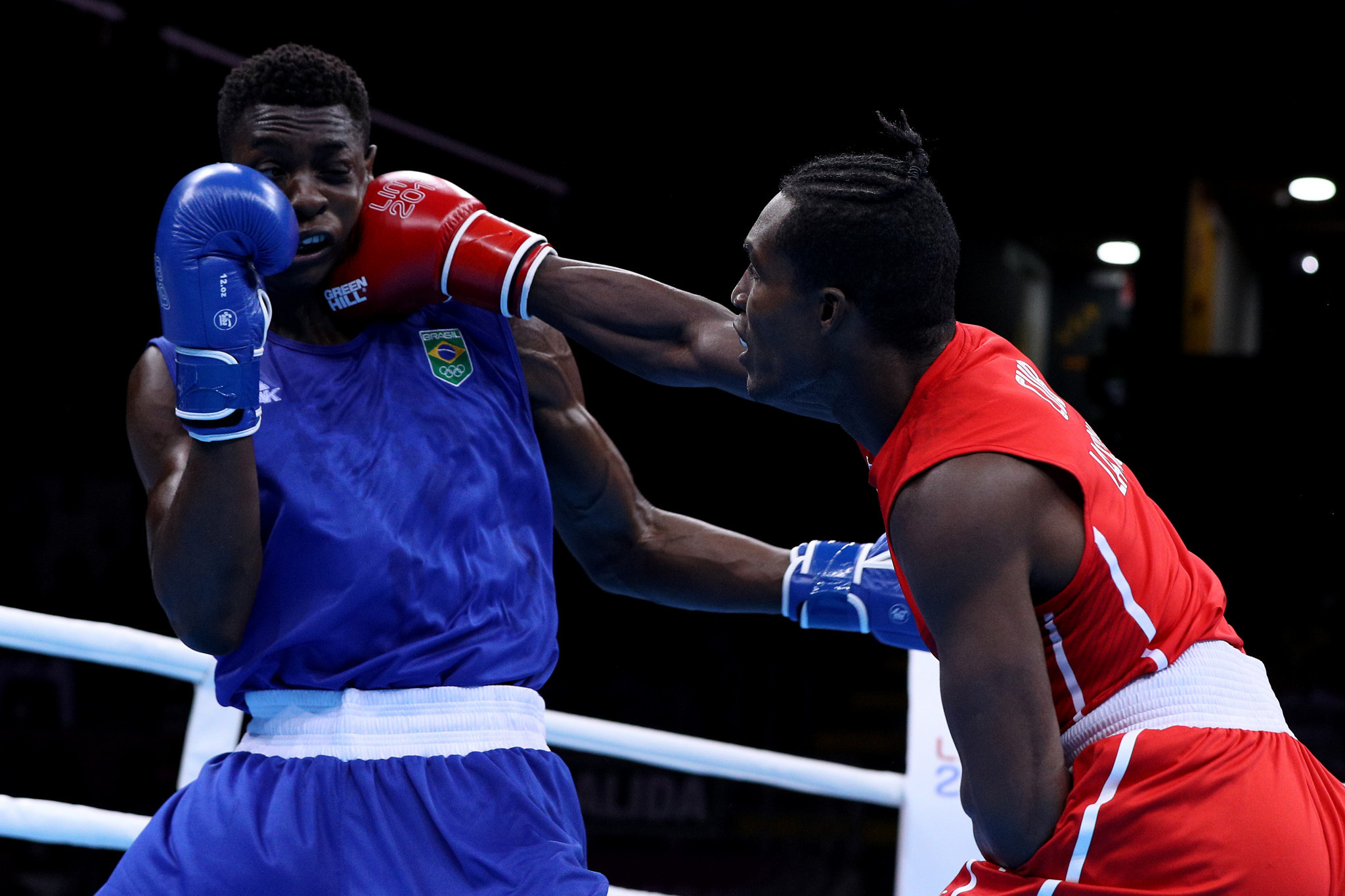 Julio La Cruz, right, won heavyweight gold at Tokyo 2020, but was denied a fifth consecutive AIBA World Boxing Championships gold at Yekaterinburg in 2019 ©Getty Images