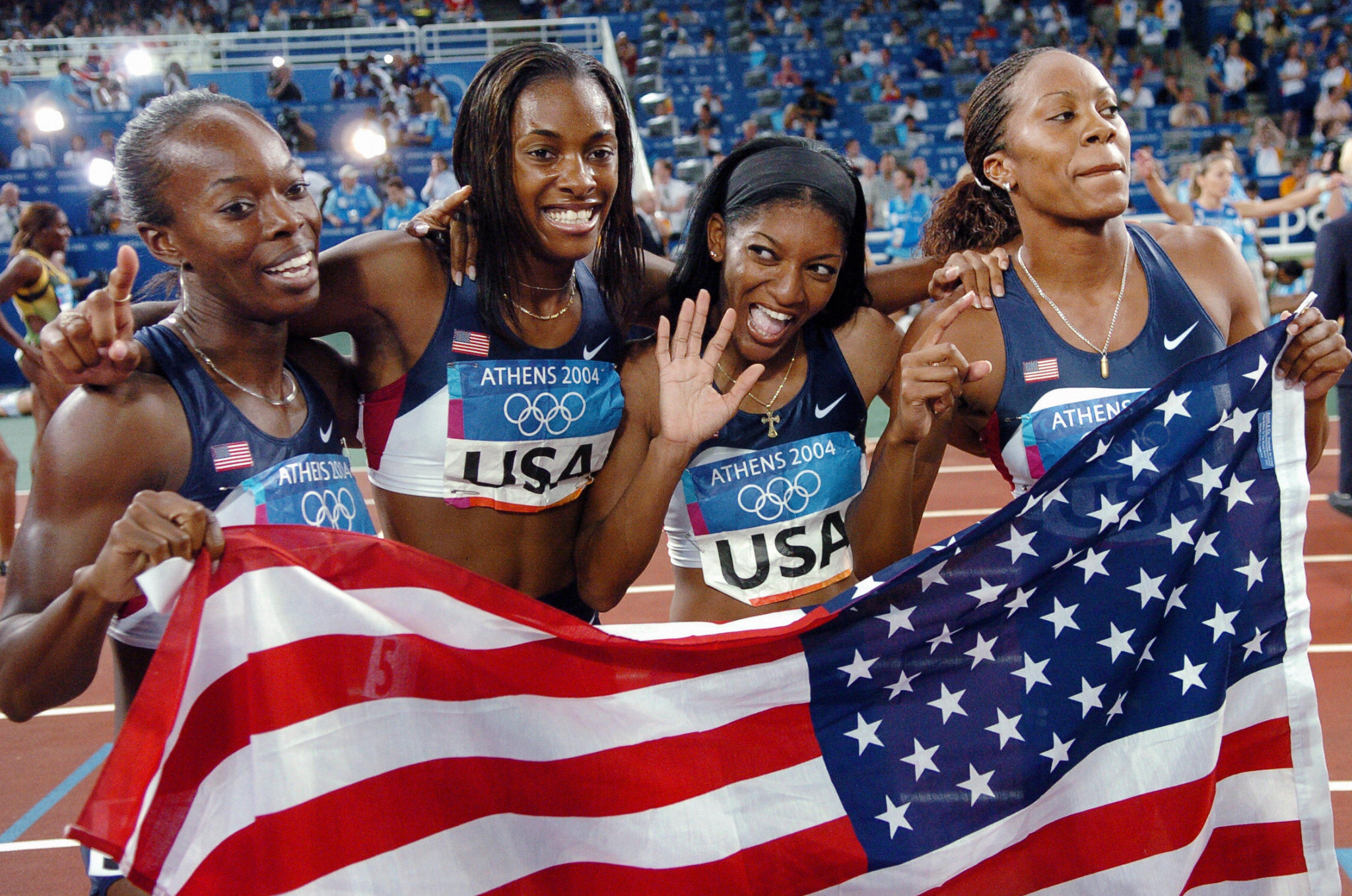 Former Olympic champion Moushaumi Robinson, second left, chairs the Team USA Council on Racial and Social Justice, and said the recommendations represent 