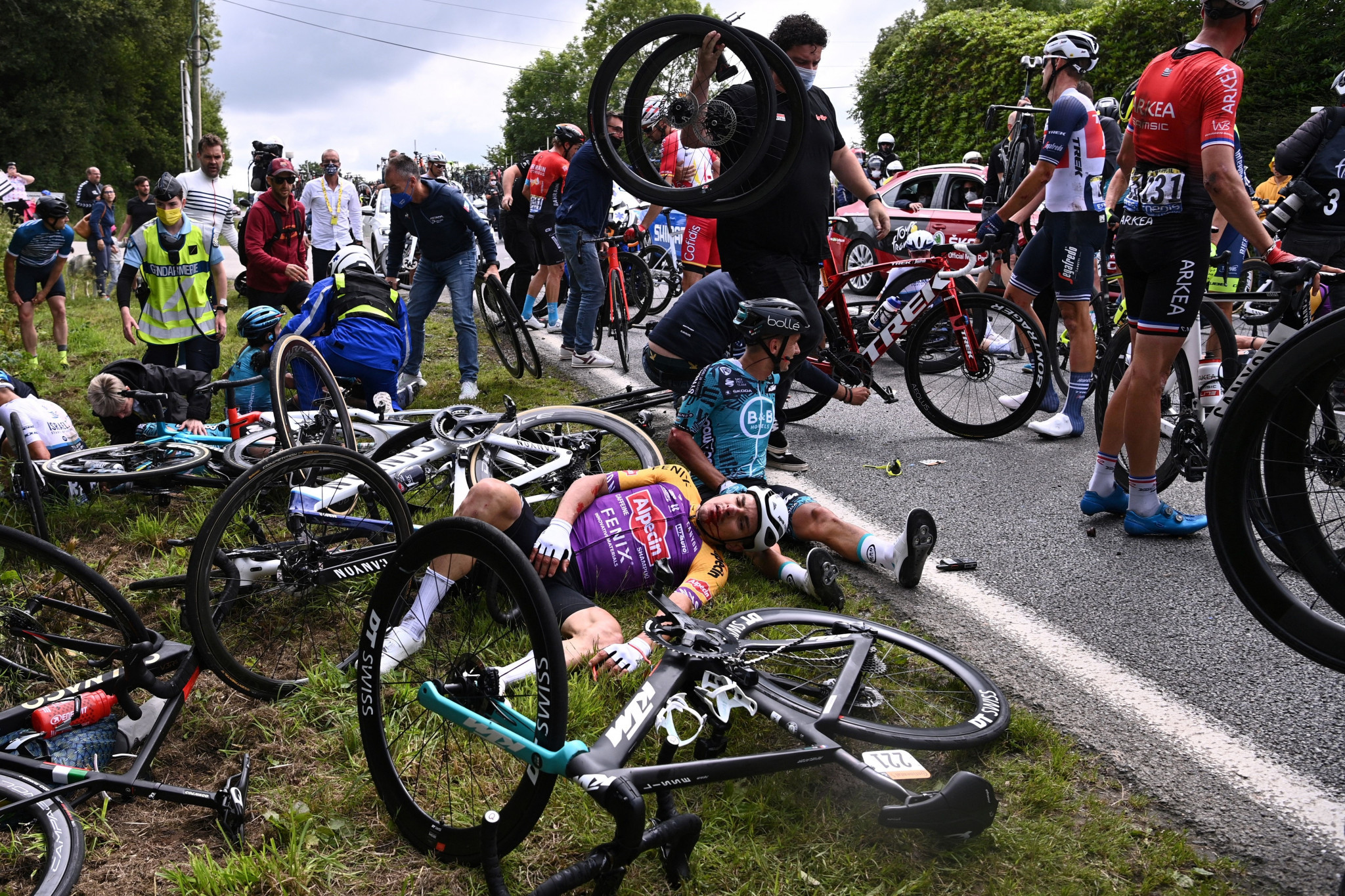 Several riders sustained injuries after the spectator's sign overhung into the road and caused Tony Martin to fall ©Getty Images