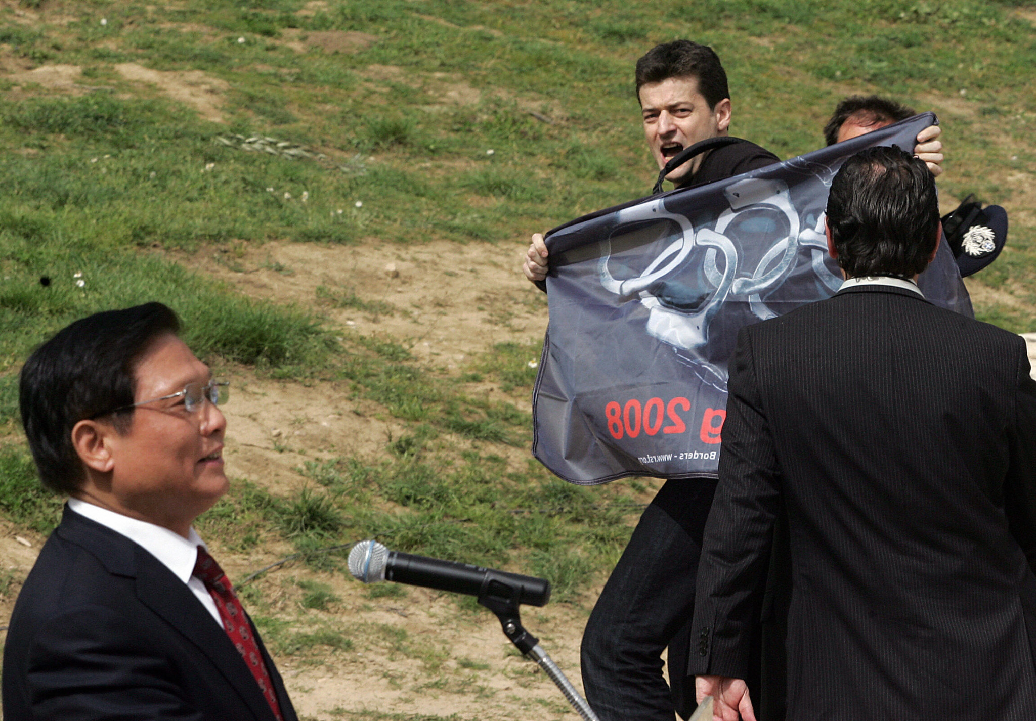 Protesters from Reporters Without Borders attempted to approach Beijing Organising Committee President Liu Qi during a speech he gave at the 2008 Flame Lighting Ceremony in Olympia ©Getty Images 