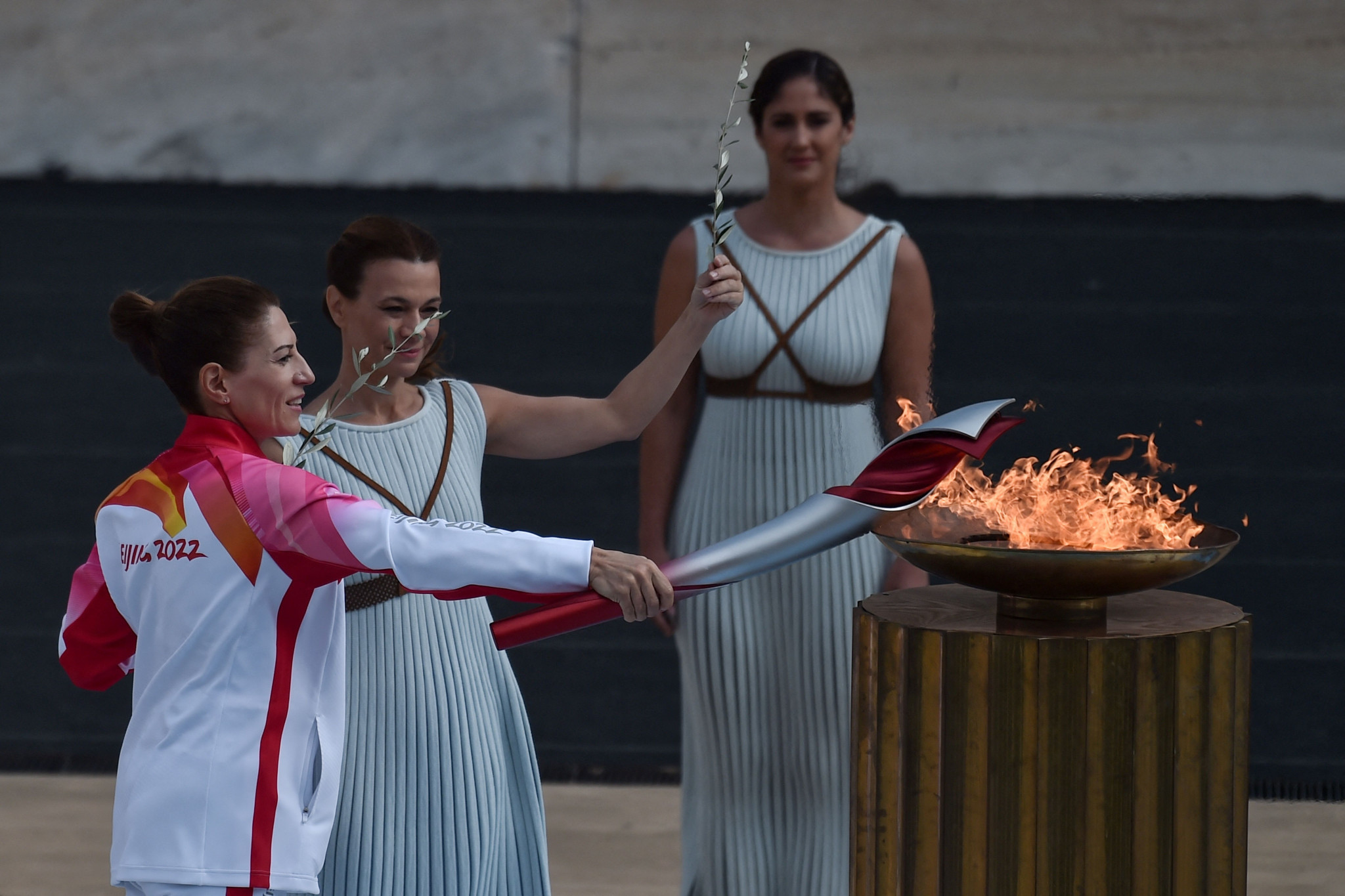Greece's Olympic cross-country skiing champion Paraskevi Ladopoulou lights the Cauldron during the Flame Handover Ceremony ©Getty Images 