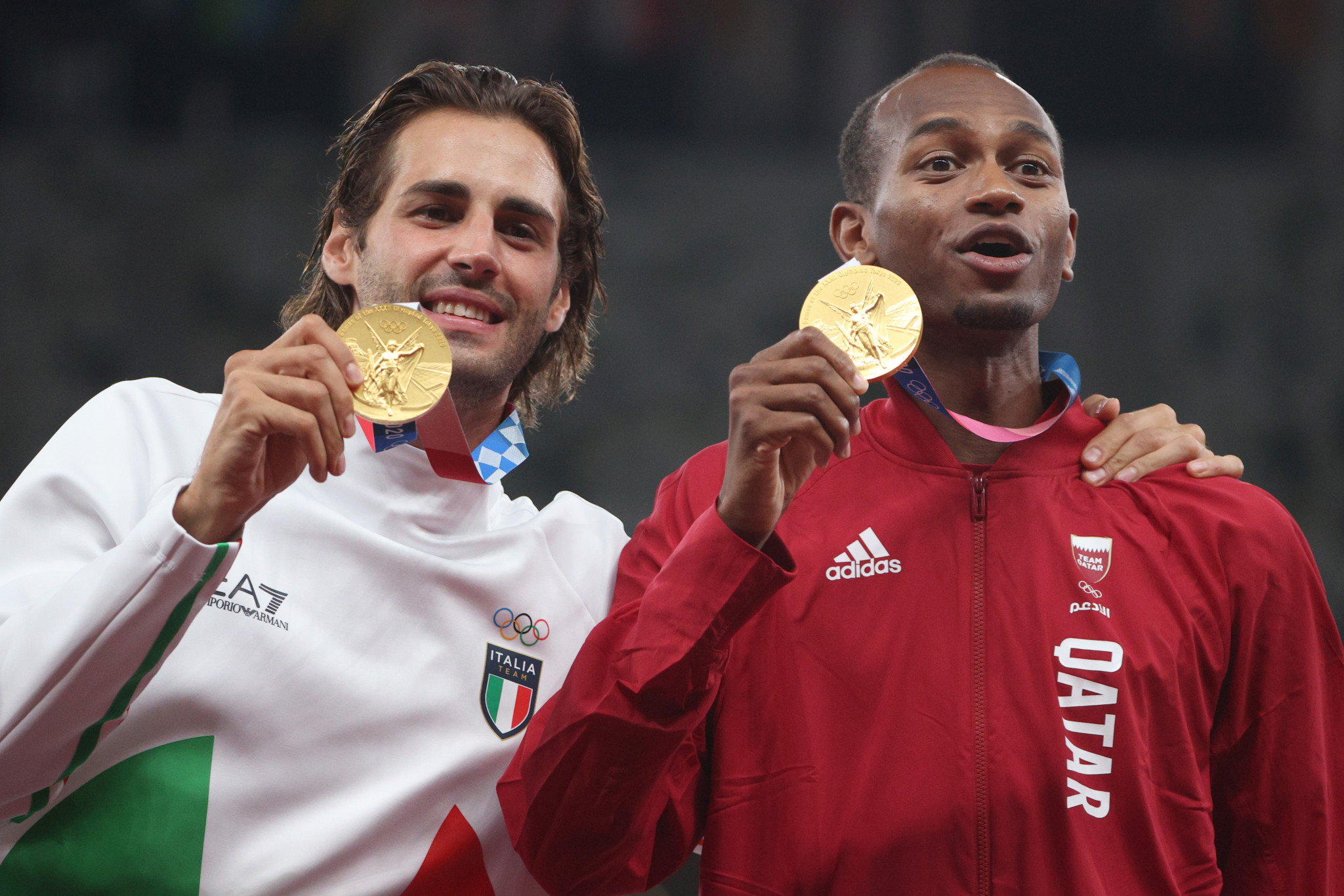 Gianmarco Tamberi, left, shared the Olympic gold medal at Tokyo 2020 with Qatar's Mutaz Barshim ©Getty Images